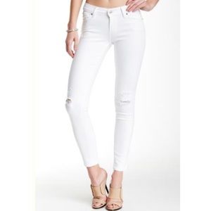 white ripped levi jeans